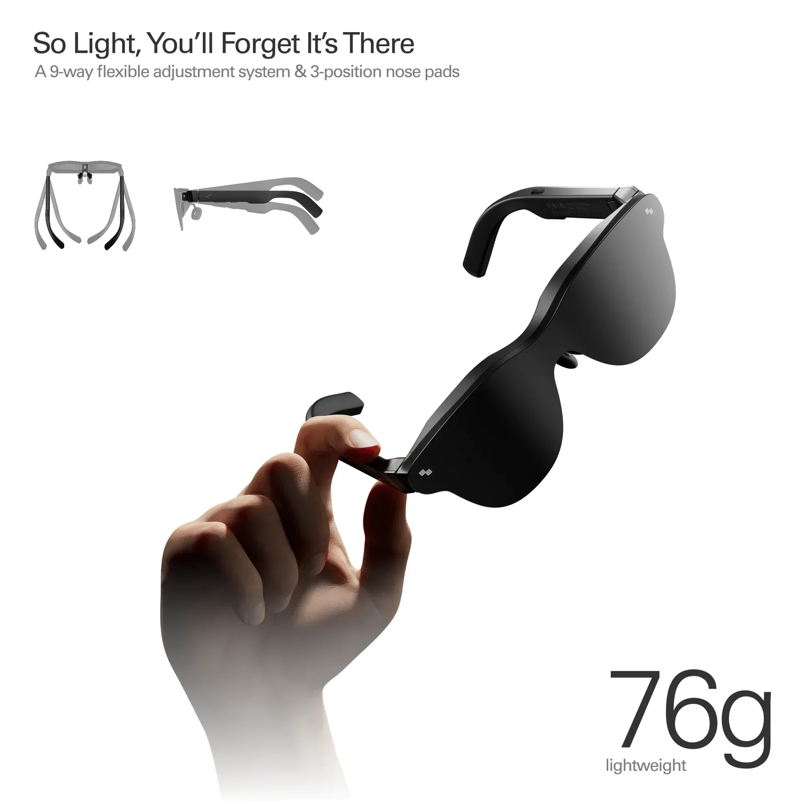 The RayNeo Air 4 Pro held in one hand, showing the 76 g weight